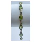 10K GOLD FACETED PERIDOT LINKS 7"L - 6.98 GRAMS