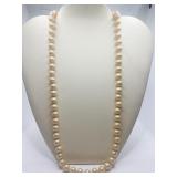 14K CLASP ON STRAND OF HAND KNOTTED MAN-MADE