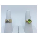14K RINGS - SZ. 7 PERIDOT CENTER AND RAISED LEAF