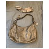 GOLD COACH PURSE LIGHT USE