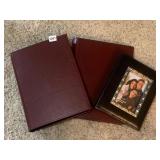 PICTURE FRAMES AND PHOTO ALBUMS .