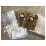 PHOTO ALBUMS AND PROTECTIVE PAGES