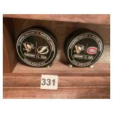 TWO 2020 NHL HOCKEY PUCKS