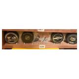 4 NHL HOCKEY PUCKS