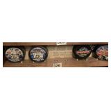 4 NHL HOCKEY PUCKS