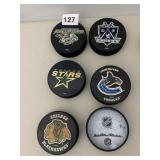 6 HOCKEY PUCKS DALLAS STAR REMOVABLE TAPE ON BACK