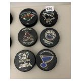 6 HOCKEY PUCKS OILERS REMOVABLE TAPE ON BACK
