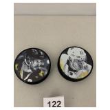 2 PENS HOCKEY PUCKS