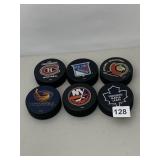 6 HOCKEY PUCKS