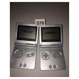 2 SILVER GAMEBOY SPS 1 HAS SCREEN DEBRIS BEHIND