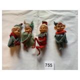 4 PIXIE ELVES HOLDING THEIR KNEE