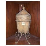 DECORATIVE URN IN IRON STAND