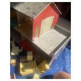 TIN DOLL HOUSE WITH SOME FURNITURE
