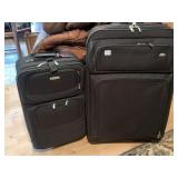 TWO SUITCASES W/ HANDLE AND 2 REAR WHEELS