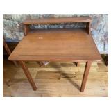 SMALL WOOD DESK WITH SMALL RAISED SHELF AND