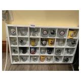 28 ASSORTED SHOT GLASSES IN 12X20 DISPLAY CASE