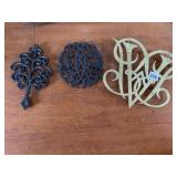 BRASS WILLIAMS BURGH TRIVETS AND 2 CAST IRON 1S