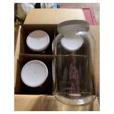 4 NEW GLASS JARS W/ LIDS
