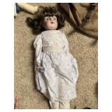 BISQUE HEAD DOLL COMP BODY AND CLOTH