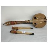 HAND MADE STRING INSTRUMENT WITH MATCHING STICKS