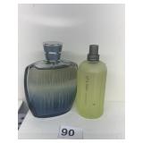 GRAPHITE BLUE 3.4 FL. OZ AND OF A MAN 3.4 OZ.