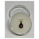 PEACH TOURMALINE IN 14K GOLD SETTING