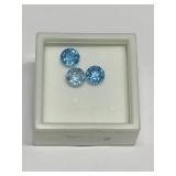THREE 7MM LIGHT BLUE STONES