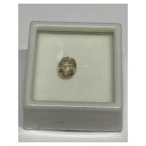 CLEAR STONE WITH GOLD STRIATIONS POSSIBLY