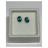 PAIR TEAL TOPAZ OVAL 7X5MM STONES