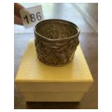 RAISED DESIGN STERLING NAPKIN RING .50 OZT