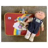 CABBAGE PATCH DOLL WITH SUITCASE FULL OF CABBAGE