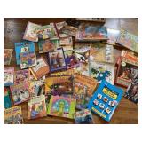 WHITE PLASTIC BIN WITH CHILDRENï¿½S BOOKS AND