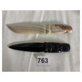 2 STONE CARVED KNIVES, BLACK ONE HAS 2 SMALL