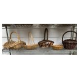 SEVERAL BASKETS WITH HANDLES ONE WITHOUT