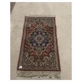 MACHINE MADE RUG 45" X 24"