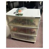 ROLLING WIDE CHEST PLASTIC FILLED W/ SMALL TOYS
