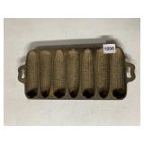 CAST IRON CORN BREAD MOLD, MARKED 7B