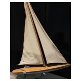 WOOD BOAT W/ CANVAS SAIL 36" H X 24" L APPROX.