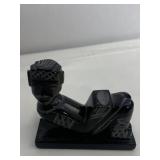 CARVED BLACK STONE FIGURE PURCHASES IN ALASKA