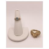 14K RING W/ AQUA MARINE CENTER W. RHINESTONES SZ.