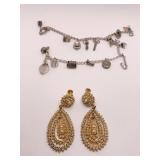 TWO CHARM BRACELETS 3 STERLING CHARMS AND GOLD