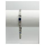 14K GOLD SYNTHETIC SAPPHIRE AND DIAMOND W/ BOW