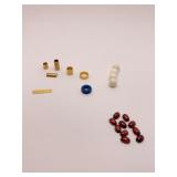 WHITE BEADS, GARNET STONES AND GOLD TONE SPACERS