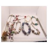 ASSORTED COSTUME JEWELRY BRACELETS AND ONE