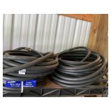 UNKNOWN LENGTH OF BLACK CRAFTSMAN GARDEN HOSES &