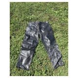 SZ. 38 LEATHER PANTS BY INTRO HAS A HOLE
