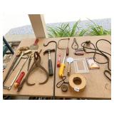 ANTIQUE ICE TONGS, HAND SAWS, ETC.