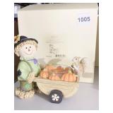 AUTUMN SCARECROW VOTIVE W/ PUMPKINS IN BASKET
