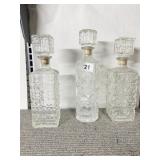 3 DECANTERS WITH STOPPERS