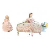 LACE WOMAN ON PORCELAIN SOFA HAS BROKEN AREA ON